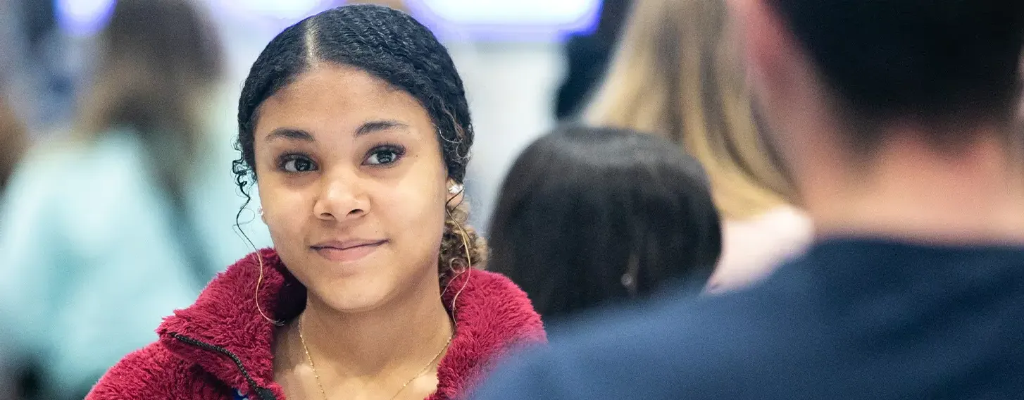 Student looking at someone smiling